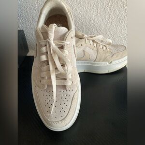 Low top off white Nike air.